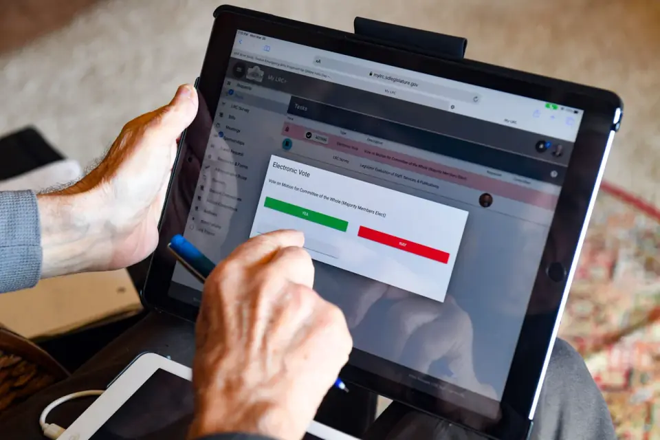 MyLRC's Electronic Vote dialog on Rep. Michael Saba's iPad, with Yea and Nay voting controls.